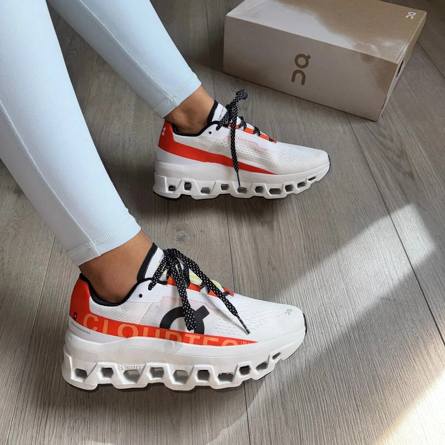 ON RUNNING CLOUDMONSTER BLANCO-NARANJA