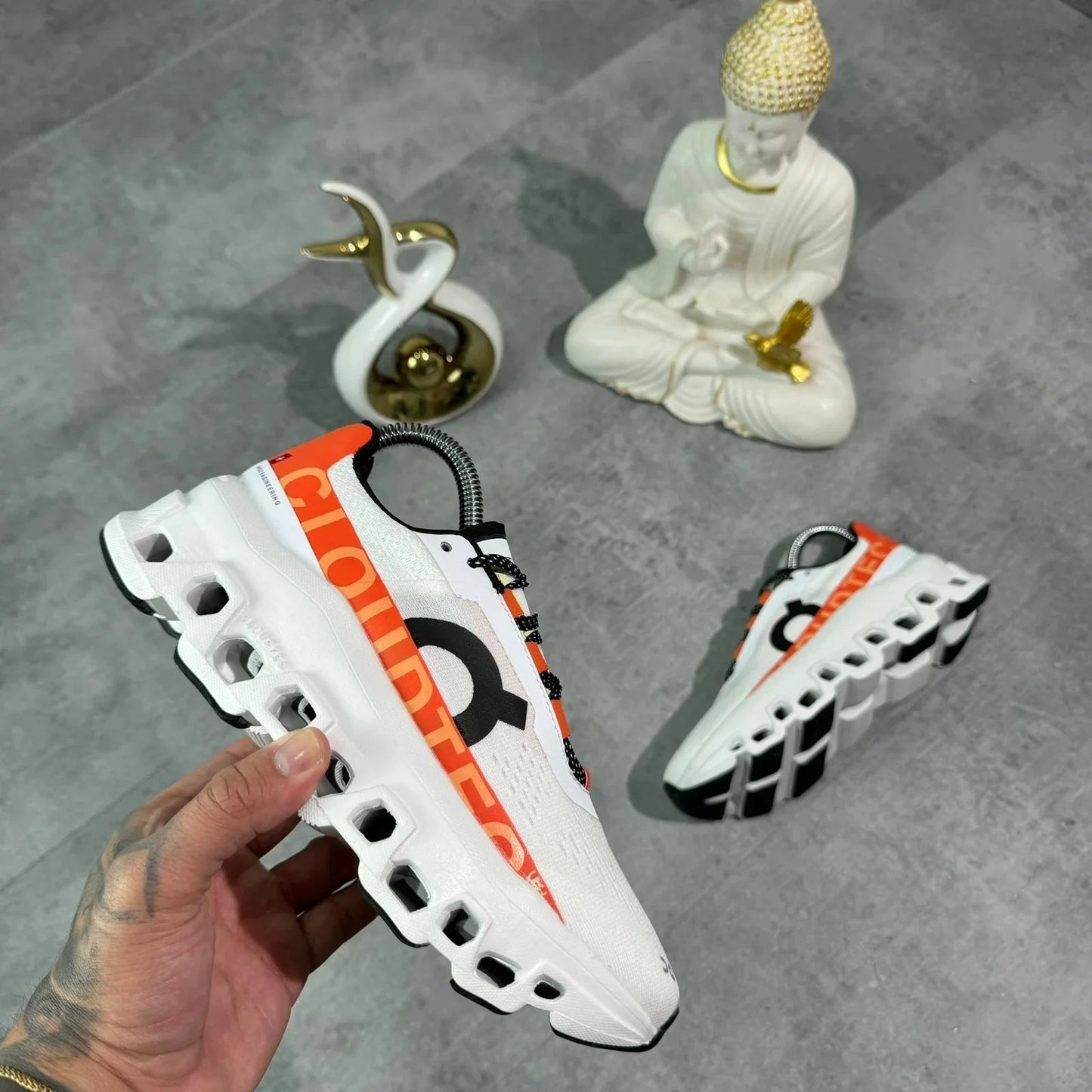ON RUNNING CLOUDMONSTER BLANCO-NARANJA